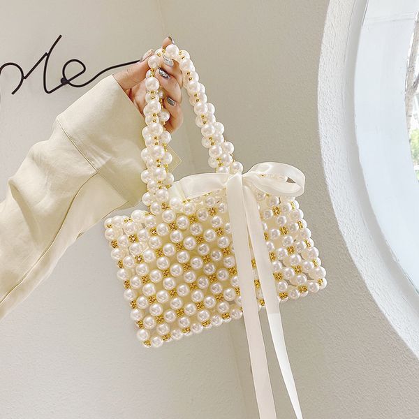 2020 summer pearl bag lady hand-woven beaded bag fashion joie de vive fairy handbag
2020 summer pearl bag lady hand-woven beaded bag fashion joie de vive fairy handbag