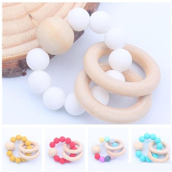 new 16 style baby teether rings food grade beech wood teething ring soothers chew toys shower play chew round wooden bead silicone teether
new 16 style baby teether rings food grade beech wood teething ring soothers chew toys shower play chew round wooden bead silicone teether