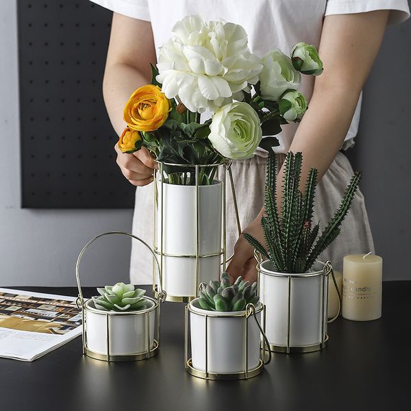 modern ceramic flower vase with golden metal frame portable decorative vase ornaments home wedding decoration gifts
modern ceramic flower vase with golden metal frame portable decorative vase ornaments home wedding decoration gifts