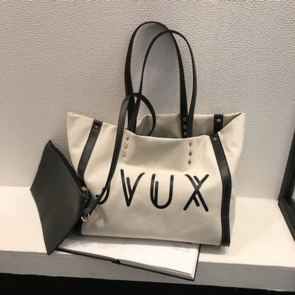 canvas handbag 2019 new fashion letters fashion shoulder bag versatile portable female shoulder large capacity bag tide
canvas handbag 2019 new fashion letters fashion shoulder bag versatile portable female shoulder large capacity bag tide