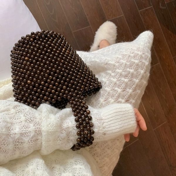 women acrylic pearl tote handle braided bead bucket bag handmade drawstring small hollow handbags ladies party evening bags
women acrylic pearl tote handle braided bead bucket bag handmade drawstring small hollow handbags ladies party evening bags