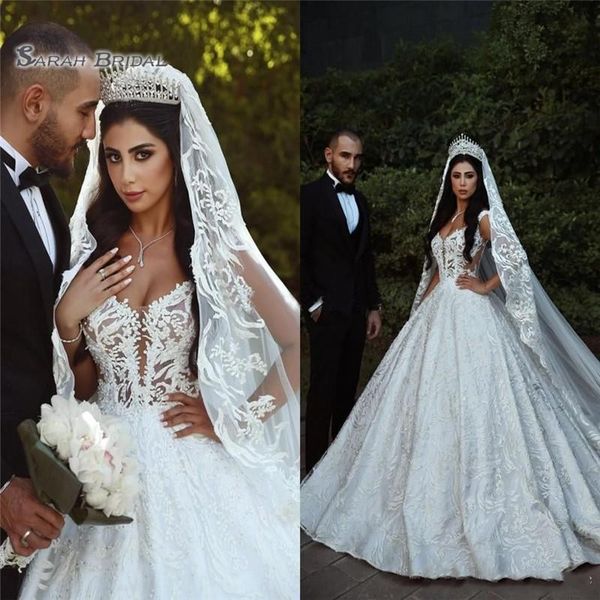 2020 arabic a line wedding dresses sheer straps illusion bodice appliques backless bridal dresses cathedral train
2020 arabic a line wedding dresses sheer straps illusion bodice appliques backless bridal dresses cathedral train