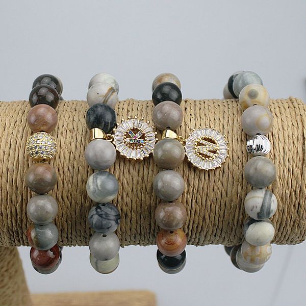 adjustable 10pcs/lot natural picasso stone bead with cz bead and pendant bracelet,handmade stone bracelet jewelry, Golden;silver
adjustable 10pcs/lot natural picasso stone bead with cz bead and pendant bracelet,handmade stone bracelet jewelry, Golden;silver
