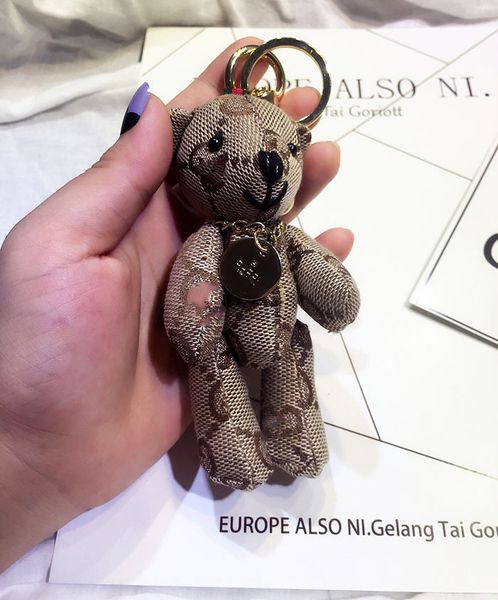 2020 new cartoon leather tassel key chain fashion bear keychain ring ornament for bag key chain men and women give a small gift, Silver
2020 new cartoon leather tassel key chain fashion bear keychain ring ornament for bag key chain men and women give a small gift, Silver