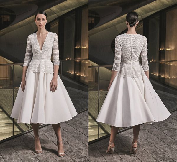 2019 naeem khan short wedding dresses deep v neck lace sequins tea length modest wedding dress custom made boho bridal gowns long sleeve, White
2019 naeem khan short wedding dresses deep v neck lace sequins tea length modest wedding dress custom made boho bridal gowns long sleeve, White
