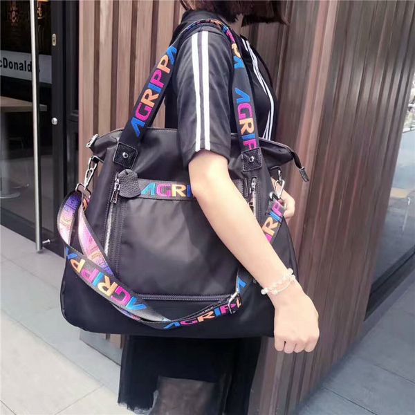 new canvas travel bag large capacity handbag shoulder female portable oxford cloth simple wild nylon weekend female multifunctional
new canvas travel bag large capacity handbag shoulder female portable oxford cloth simple wild nylon weekend female multifunctional