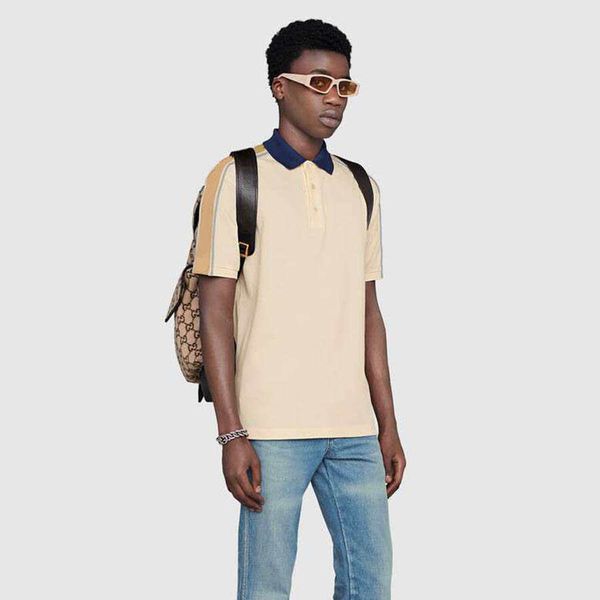 stretch cotton piquet polo-shirts interlocking g jacquard down stripe sleeves with reflective fabric piping men's women's polos, White;black
stretch cotton piquet polo-shirts interlocking g jacquard down stripe sleeves with reflective fabric piping men's women's polos, White;black