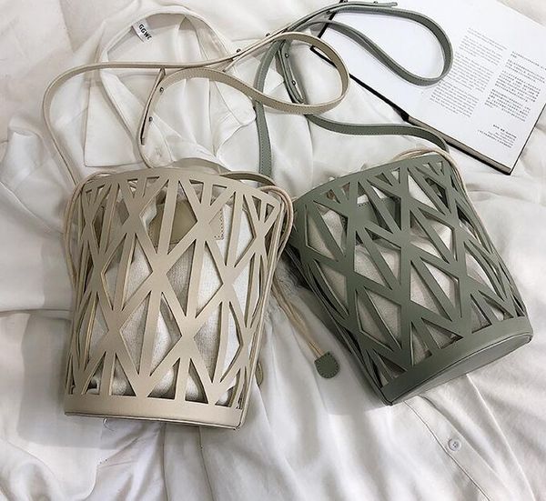 summer women hollow out tote bags cross body pu leather bag korean fashion vintage bucket bags
summer women hollow out tote bags cross body pu leather bag korean fashion vintage bucket bags