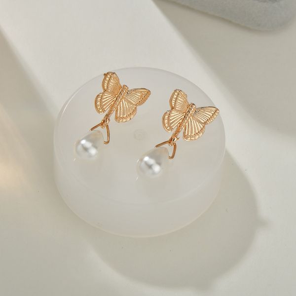tk exquisite pearl earrings alloy butterfly drop pearl pendant earrings,creative simple earrings jewelry wedding accessories, White
tk exquisite pearl earrings alloy butterfly drop pearl pendant earrings,creative simple earrings jewelry wedding accessories, White