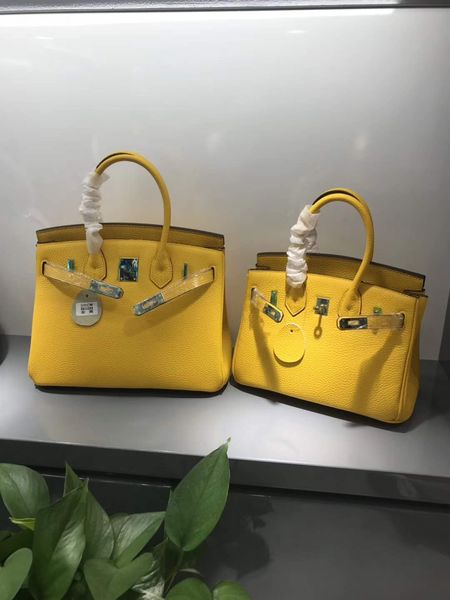 the selling fashion new brand leather clutch bag 25cm large joker business classic ladies bag with ribbon leisure luxury boston bag
the selling fashion new brand leather clutch bag 25cm large joker business classic ladies bag with ribbon leisure luxury boston bag