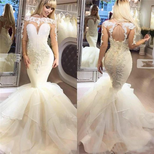 2019 Mermaid Long Sleeve Wedding Dresses Beaded Lace Appliqued Tiered Skirts Wedding Dress Sweep Train Boho Beach Bridal Gowns
2019 Mermaid Long Sleeve Wedding Dresses Beaded Lace Appliqued Tiered Skirts Wedding Dress Sweep Train Boho Beach Bridal Gowns