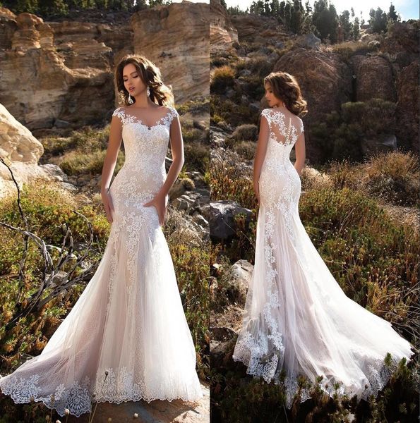 2019 Lace Mermaid Wedding Dresses Sheer Cap Sleeves Lace Applique Sweep Train Wedding Bridal Gowns With Buttons
2019 Lace Mermaid Wedding Dresses Sheer Cap Sleeves Lace Applique Sweep Train Wedding Bridal Gowns With Buttons