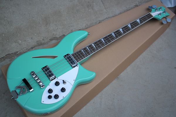 factory custom semi-hollow green electric bass guitar with 4 strings,white pickguard,rosewood fingerboard,offer customized
factory custom semi-hollow green electric bass guitar with 4 strings,white pickguard,rosewood fingerboard,offer customized