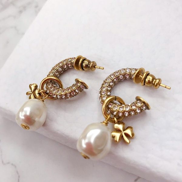 selling full diamond pearl pendant designer earrings luxury designer jewelry women earrings, Golden
selling full diamond pearl pendant designer earrings luxury designer jewelry women earrings, Golden
