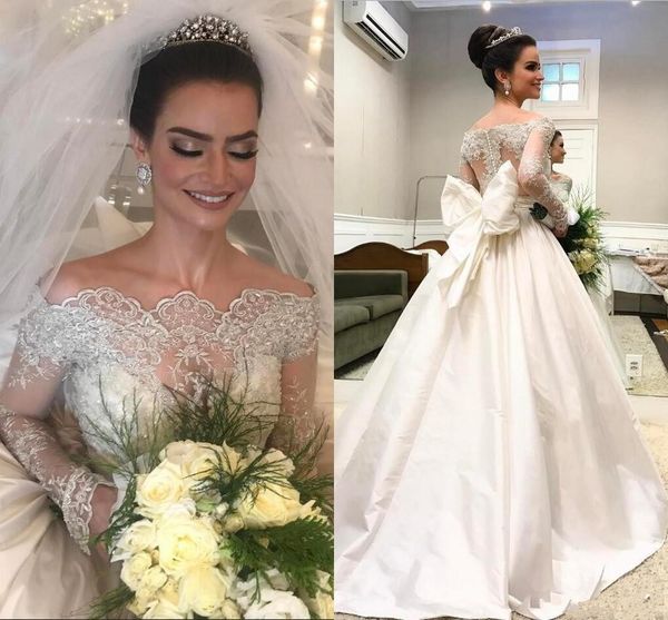 elegant princess ball gown 2020 wedding dresses satin bateau long sleeves lace sequins bridal gowns bow button back vestidos de novia 186, White 
elegant princess ball gown 2020 wedding dresses satin bateau long sleeves lace sequins bridal gowns bow button back vestidos de novia 186, White