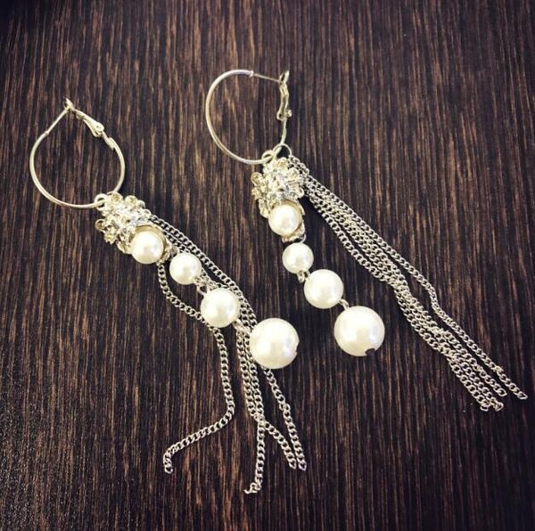женщины леди мода элегантный silver pearl кисточки цепи круглый стержня уха обруч серьги падения подарка ювелирных изделий
женщины леди мода элегантный silver pearl кисточки цепи круглый стержня уха обруч серьги падения подарка ювелирных изделий