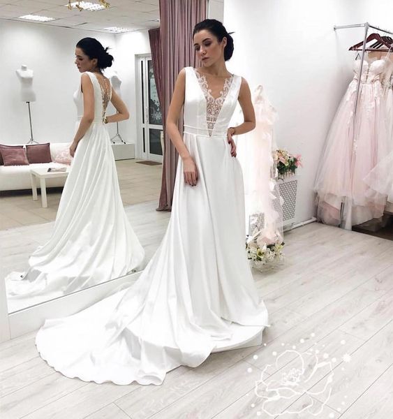 modest wedding dresses a-line white satin court train modern wedding dresses lace appliques covered buttons vestidos de noche bridal gowns
modest wedding dresses a-line white satin court train modern wedding dresses lace appliques covered buttons vestidos de noche bridal gowns