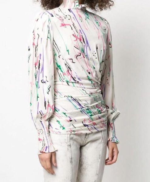 woman white colorful graffiti print silk blouse asymmetric creased cinched waist high collar flounce detail long sleeves
woman white colorful graffiti print silk blouse asymmetric creased cinched waist high collar flounce detail long sleeves