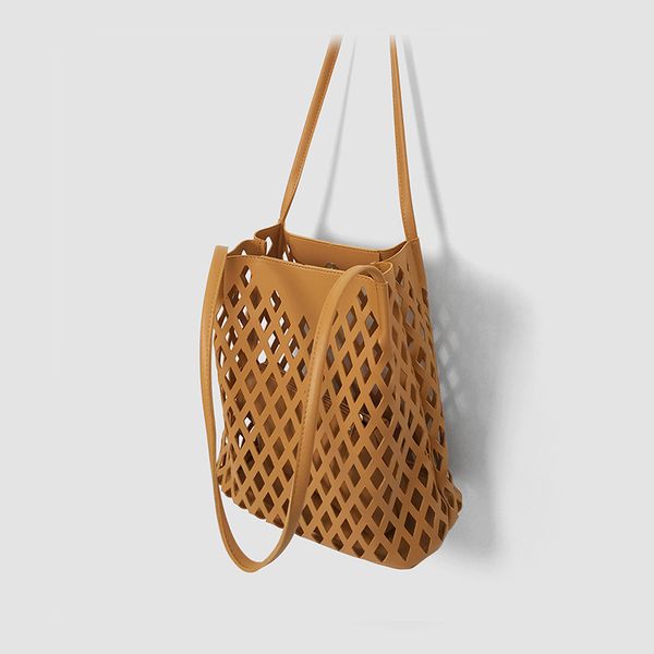 grid bag hollow large capacity bucket bag 2019 new pure color single shoulder
grid bag hollow large capacity bucket bag 2019 new pure color single shoulder