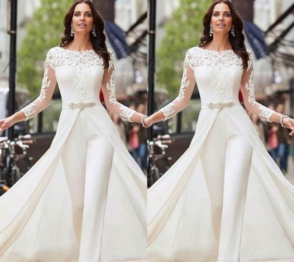 long sleeve white jumpsuits wedding dresses lace satin with overskirts beads crystals plus size bridal gowns pants dress vestidos de novia
long sleeve white jumpsuits wedding dresses lace satin with overskirts beads crystals plus size bridal gowns pants dress vestidos de novia