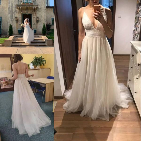 new fashion lace spaghetti strap deep v neck wedding dress vestido de novia backless tulle a line bohemian beach long wedding gowns, White
new fashion lace spaghetti strap deep v neck wedding dress vestido de novia backless tulle a line bohemian beach long wedding gowns, White