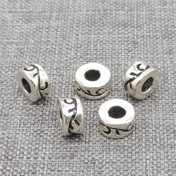 other 10pcs of 925 sterling silver donut beads w/ spiral vine imprint tire spacer