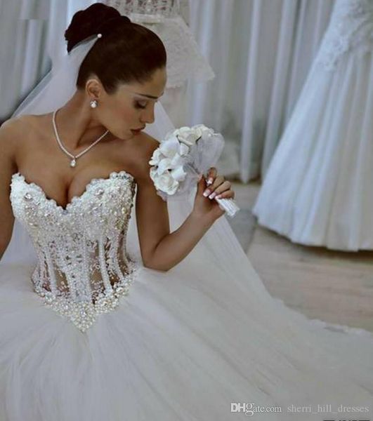 white ball gown wedding dresses sweetheart corset see through floor length princess bridal gowns beaded lace pearls custom made dh345
white ball gown wedding dresses sweetheart corset see through floor length princess bridal gowns beaded lace pearls custom made dh345