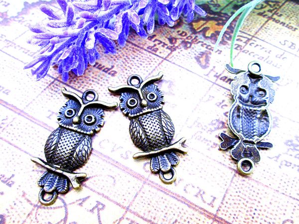 45pcs--owl connectors, antique bronze owls charms pendants 34x17mm, Bronze;silver 
45pcs--owl connectors, antique bronze owls charms pendants 34x17mm, Bronze;silver