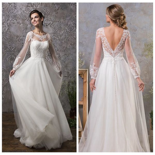 jewel neck see through white wedding dresses exquisite a line lace applique beach wedding dress backless long sleeve wedding dresses 
jewel neck see through white wedding dresses exquisite a line lace applique beach wedding dress backless long sleeve wedding dresses