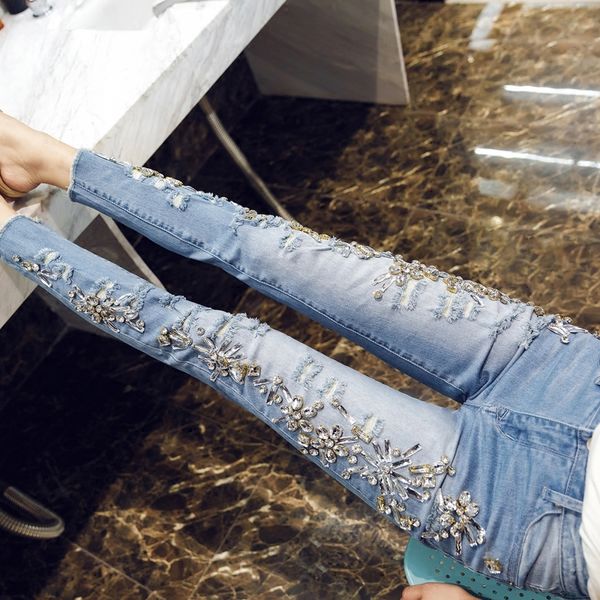 hand nailed beads 2019 with diamond belt water drill jeans, women's hole-in-the-hole trousers, nine-minute trousers tide, Blue
hand nailed beads 2019 with diamond belt water drill jeans, women's hole-in-the-hole trousers, nine-minute trousers tide, Blue