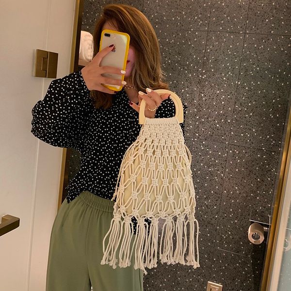 summer bohemian hollow out rope women tote bags 2019 new quality cotton rope women designer handbags wood handle shoulder bags
summer bohemian hollow out rope women tote bags 2019 new quality cotton rope women designer handbags wood handle shoulder bags
