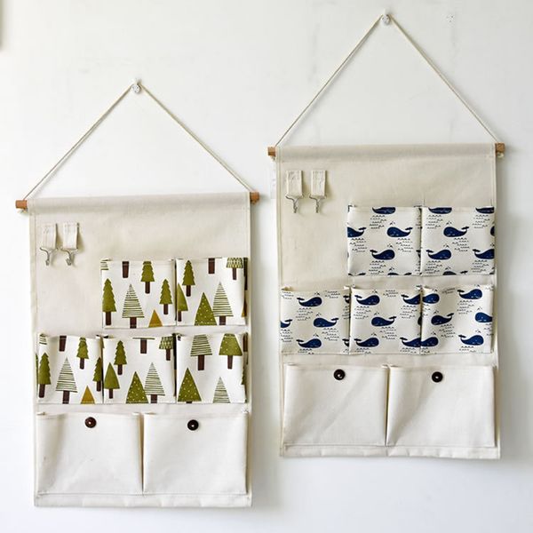 new selling 7 pockets fabric hanging wall hanging storage bag with multi-layer household debris storage wall bag
new selling 7 pockets fabric hanging wall hanging storage bag with multi-layer household debris storage wall bag