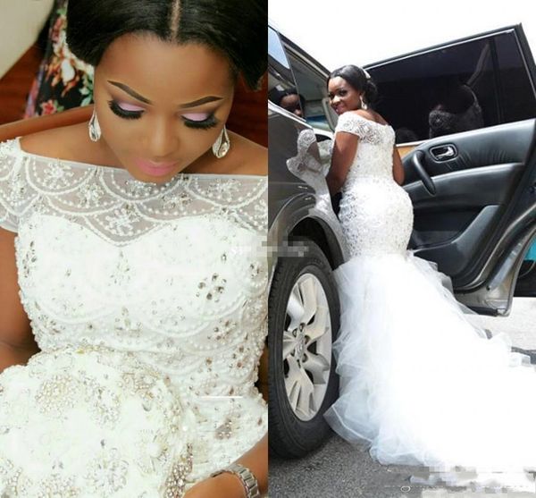 2019 bateau neck african nigeria mermaid wedding dresses plus size crystal beaded tiered ruffles court train custom formal bridal gowns, White
2019 bateau neck african nigeria mermaid wedding dresses plus size crystal beaded tiered ruffles court train custom formal bridal gowns, White