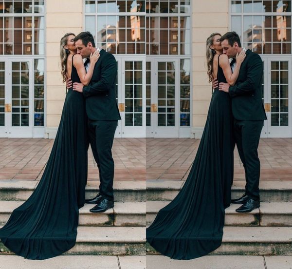 modest a line black evening prom dress v neck sleeveless spaghetti satin party dress sweep train backless robes de soirée 
modest a line black evening prom dress v neck sleeveless spaghetti satin party dress sweep train backless robes de soirée