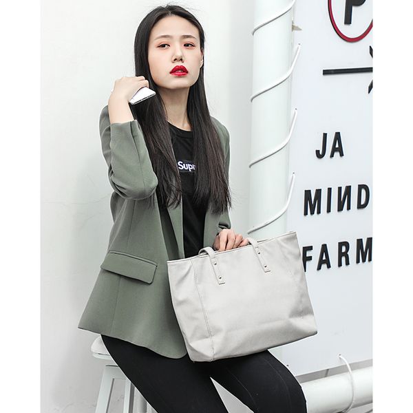 japanese travel , single shoulder , hand-held , large capacity,simple fashion bag 
japanese travel , single shoulder , hand-held , large capacity,simple fashion bag