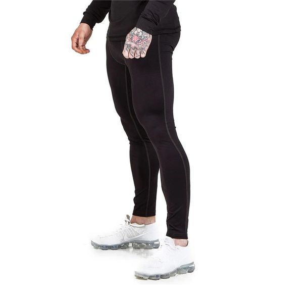 men sport pants running pants gym compression leggings fitness clothing joggers bodybuilding track male elastic sweatpants, Black;blue
men sport pants running pants gym compression leggings fitness clothing joggers bodybuilding track male elastic sweatpants, Black;blue