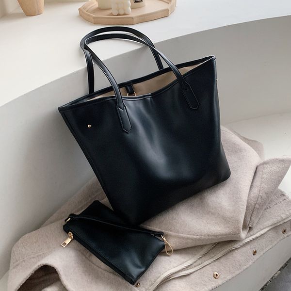new ladies shoulder bag pu large capacity mother and child bag fashion tote trend soft leather solid color simple handbag
new ladies shoulder bag pu large capacity mother and child bag fashion tote trend soft leather solid color simple handbag