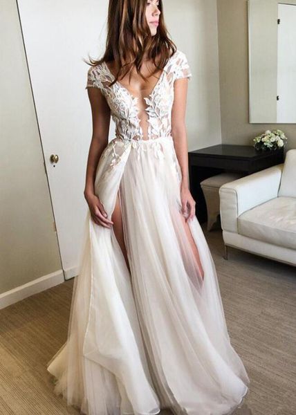 sheer lace boho beach wedding dresses with high split sweep train custom applique a line bridal gowns, White
sheer lace boho beach wedding dresses with high split sweep train custom applique a line bridal gowns, White