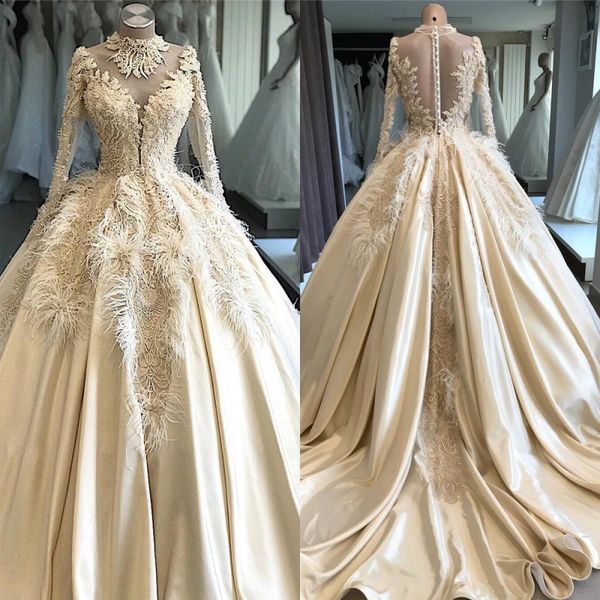 gorgeous crystals lace ball gown wedding dresses with feathers luxury champagne long sleeve wedding gowns vestido de noiva, White
gorgeous crystals lace ball gown wedding dresses with feathers luxury champagne long sleeve wedding gowns vestido de noiva, White