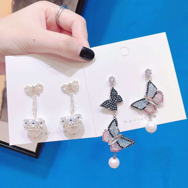 sweet exquisite crystal butterfly zircon bow pearl love flower silver needle earrings temperament ladies jewelry
sweet exquisite crystal butterfly zircon bow pearl love flower silver needle earrings temperament ladies jewelry