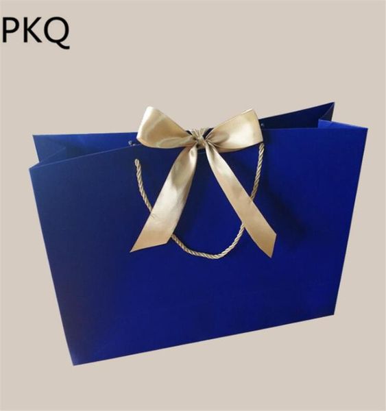 10pcs 28*9*20cm gift paper packing bags with ribbon handle shopping clothing bag cosmetics gift packaging bag
10pcs 28*9*20cm gift paper packing bags with ribbon handle shopping clothing bag cosmetics gift packaging bag