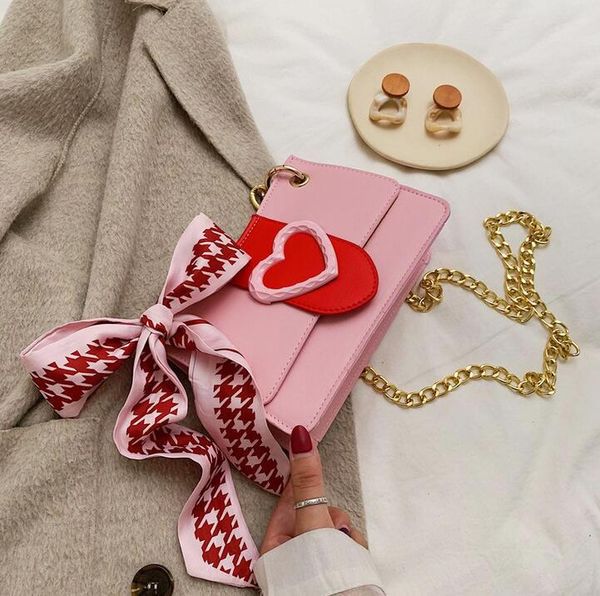 the est brand recommended ladies mini shoulder bag designer love lock buckle bow purse cute sweet scarf mobile phone bag ing
the est brand recommended ladies mini shoulder bag designer love lock buckle bow purse cute sweet scarf mobile phone bag ing