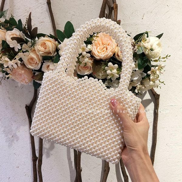 handmade women pearl bags designer beaded shoulder bags charm white pearls crossbody bag luxury evening clutch purse lady 2019
handmade women pearl bags designer beaded shoulder bags charm white pearls crossbody bag luxury evening clutch purse lady 2019