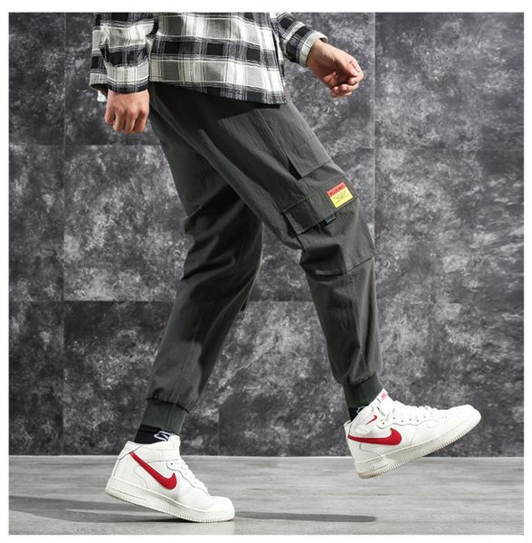 Fashion Designer Mens Cargo Pants Hip Pop Pencil Pants With Pockets Mens Loose Drawstring Printed Pants
Fashion Designer Mens Cargo Pants Hip Pop Pencil Pants With Pockets Mens Loose Drawstring Printed Pants