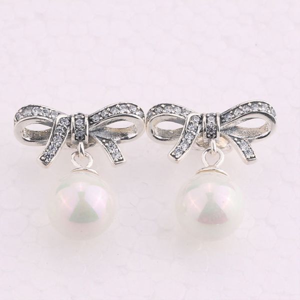 fashion bow cz diamond stud earrings for pandora 925 sterling silver delicate feelings pearl pendant earrings ladies earrings, Golden;silver
fashion bow cz diamond stud earrings for pandora 925 sterling silver delicate feelings pearl pendant earrings ladies earrings, Golden;silver