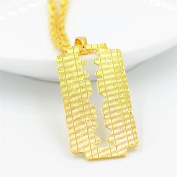 fashion- style razor blade pendant necklace alloy gold color iced out rhinestones with 70cm chain necklace for men christmas gift, Silver
fashion- style razor blade pendant necklace alloy gold color iced out rhinestones with 70cm chain necklace for men christmas gift, Silver