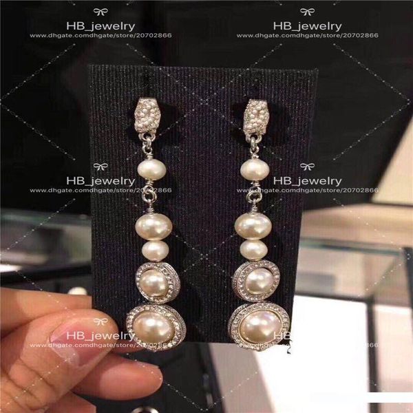 popular fashion brand high version double pearl tassel earrings for lady design women party wedding luxury jewelry for bride with box, Golden;silver
popular fashion brand high version double pearl tassel earrings for lady design women party wedding luxury jewelry for bride with box, Golden;silver
