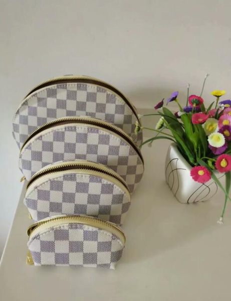 classic 4 piece sets Cosmetic Bags men travelling toilet bag women wash bag large capacity cosmetic bags makeup toiletry bag Pouch
classic 4 piece sets Cosmetic Bags men travelling toilet bag women wash bag large capacity cosmetic bags makeup toiletry bag Pouch