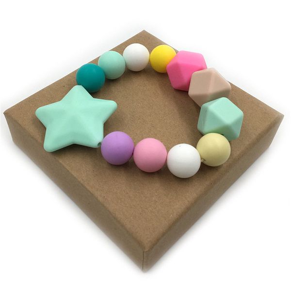 baby teething chew toy bpa safe silicone star nursing bracelet charms chewable silicone beads diy craft baby teether 
baby teething chew toy bpa safe silicone star nursing bracelet charms chewable silicone beads diy craft baby teether