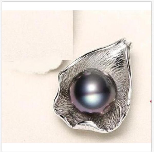 10mm + natural south sea genuine black pearl pendant 925 silver
10mm + natural south sea genuine black pearl pendant 925 silver